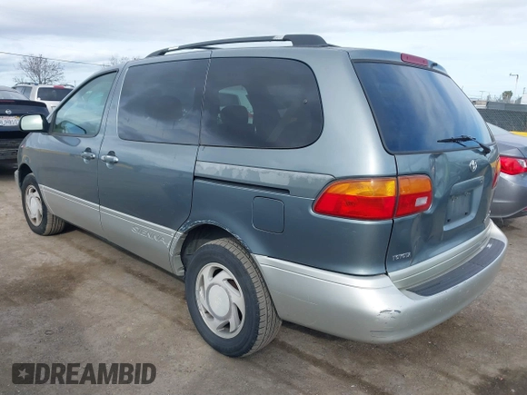 1999 Toyota Sienna LE with VIN 4T3ZF13C2XU136847, listed as a IAAI auction lot 41663608 with 178,581 mi miles. Bid and sale history available at carsss.com. Image 3.