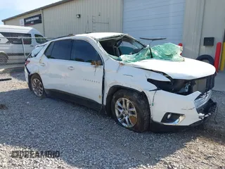 2021 Chevrolet Traverse LT Cloth z VIN 1GNERGKW8MJ176940, wystawiony jako IAAI lot #42291695 z przebiegiem 29 421 mil mil oraz . Historia ofert i sprzedaży dostępna na DreamBid. Obrazek 1.