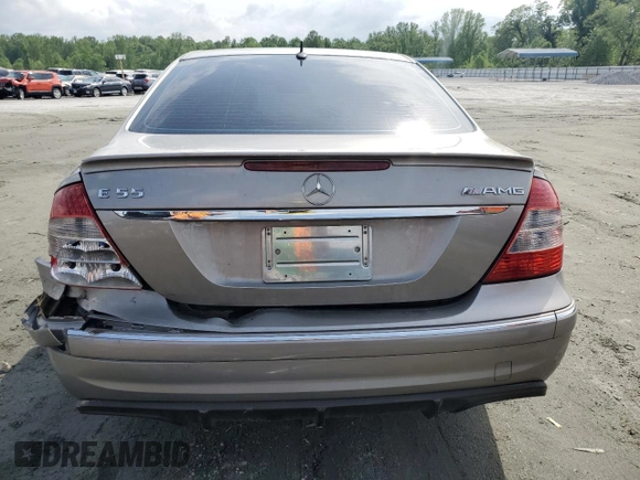 2005 Mercedes-Benz E-Class 5.5L AMG with VIN WDBUF76J15A768563, listed as a Copart auction lot 54874585 with 108,952 mi miles and Salvage Title. Bid and sale history available at carsss.com. Image 7.
