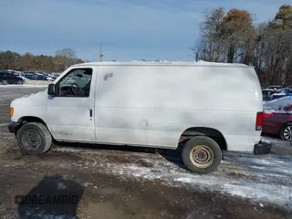 2006 Ford Econoline Cargo with VIN 1FTNE24WX6HB18195, listed as a IAAI auction lot 41365791 with 127,759 mi miles and . Bid and sale history available at DreamBid. Image 14.