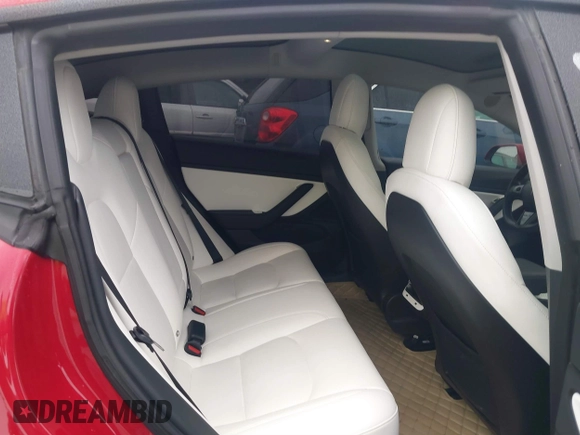 2018 Tesla Model 3 Long Range Battery z VIN 5YJ3E1EB7JF135199, wystawiony jako IAAI lot #41580853 z przebiegiem 131 774 mil mil oraz . Historia ofert i sprzedaży dostępna na DreamBid. Obrazek 8.