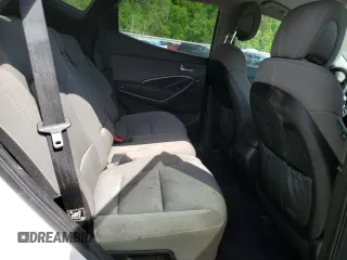 2017 Hyundai Santa Fe 2.4L z VIN 5XYZUDLB7HG388382, wystawiony jako Copart lot #57167315 z przebiegiem 128 724 mil mil oraz Szkoda całkowita • Salvage title. Historia ofert i sprzedaży dostępna na DreamBid. Obrazek 11.