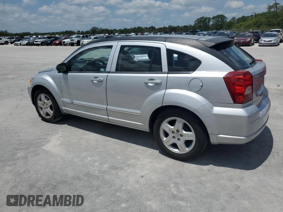 2009 Dodge Caliber SXT with VIN 1B3HB48A49D142621, listed as a Copart auction lot 55934095 with 158,885 mi miles and Non Repairable. Bid and sale history available at DreamBid. Image 2.