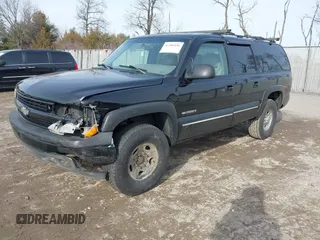 2000 Chevrolet Suburban LT with VIN 3GNGK26U0YG197958, listed as a IAAI auction lot 41506196 with 229,657 mi miles. Bid and sale history available at carsss.com. Image 2.