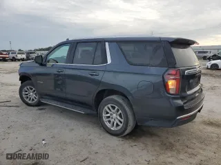 2021 Chevrolet Tahoe LT with VIN 1GNSCNKD5MR252123, listed as a Copart auction lot 42582425 with 114,130 mi miles and Salvage Title. Bid and sale history available at carsss.com. Image 2.