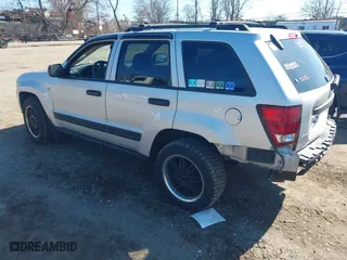 2005 Jeep Grand Cherokee Laredo with VIN 1J4HR48N65C595873, listed as a IAAI auction lot 41715998 with 145,689 mi miles. Bid and sale history available at carsss.com. Image 3.