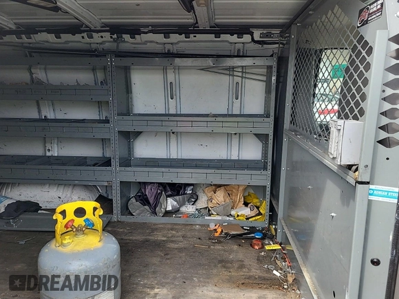 2015 Chevrolet Express Cargo with VIN 1GCZGTCG7F1172459, listed as a IAAI auction lot 42836177 with 156,729 mi miles and . Bid and sale history available at DreamBid. Image 3.
