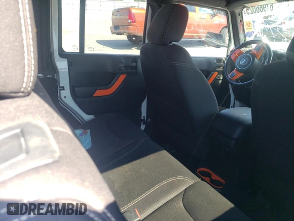 2014 Jeep Wrangler Unlimited Rubicon with VIN 1C4BJWFG4EL325544, listed as a Copart auction lot 61966025 with 149,162 mi miles and Salvage title. Bid and sale history available at DreamBid. Image 10.
