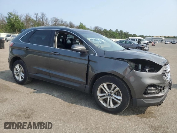 2019 Ford Edge SEL z VIN 2FMPK4J9XKBC67141, wystawiony jako Copart lot #60271615 z przebiegiem 100 400 mil mil oraz Szkoda całkowita • Salvage title. Historia ofert i sprzedaży dostępna na DreamBid. Obrazek 4.