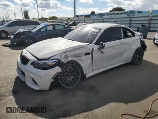 2018 BMW M2 with VIN WBS1J5C59J7B70349, listed as a Copart auction lot 85573834 with 47,128 mi miles and Salvage Title. Bid and sale history available at carsss.com. Image 1.
