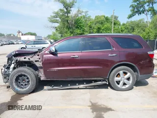 2012 Dodge Durango Citadel with VIN 1C4SDHET1CC275636, listed as a IAAI auction lot 42266742 with 212,030 mi miles and . Bid and sale history available at DreamBid. Image 14.