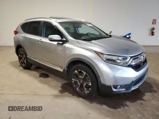 2018 Honda CR-V Touring z VIN 7FARW2H95JE012947, wystawiony jako Copart lot #64779925 z przebiegiem 20 561 mil mil oraz Szkoda całkowita • Salvage title. Historia ofert i sprzedaży dostępna na DreamBid. Obrazek 4.