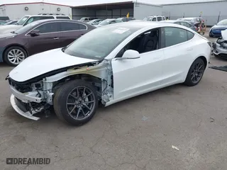 2019 Tesla Model 3 Long Range with VIN 5YJ3E1EB2KF361541, listed as a IAAI auction lot 41859373 with 54,664 mi miles. Bid and sale history available at carsss.com. Image 18.