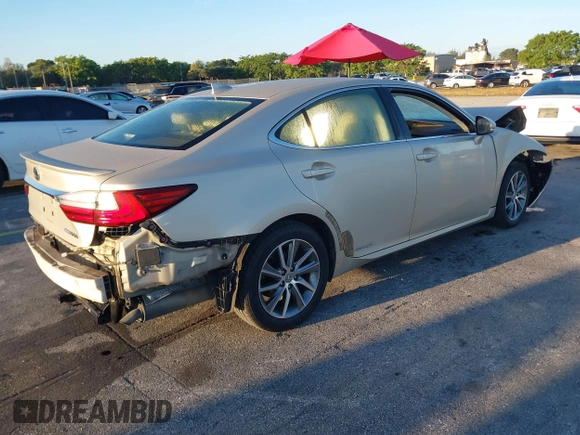 2016 Lexus ES 300h z VIN JTHBW1GG4G2106710, wystawiony jako IAAI lot #41684479 z przebiegiem 144 559 mil mil oraz . Historia ofert i sprzedaży dostępna na DreamBid. Obrazek 4.