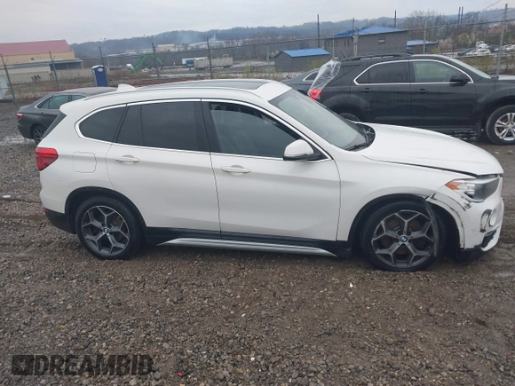2018 BMW X1 xDrive28i with VIN WBXHT3C33J5L34824, listed as a IAAI auction lot 41977462 with 84,131 mi miles and . Bid and sale history available at DreamBid. Image 13.
