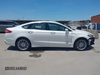 2014 Ford Fusion SE Hybrid with VIN 3FA6P0LUXER233658, listed as a IAAI auction lot 42311588 with 106,282 mi miles and . Bid and sale history available at DreamBid. Image 13.