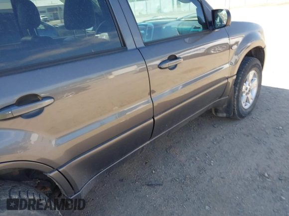 2006 Mercury Mariner Luxury с VIN 4M2CU57116KJ19454, выставлен на аукционе IAAI как лот 42436725 с пробегом 244 689 миль миль и . История ставок и продаж доступна на DreamBid. Изображение 14.
