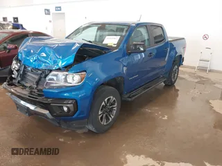 2021 Chevrolet Colorado 4WD Z71 with VIN 1GCGTDEN7M1141049, listed as a IAAI auction lot 41223962 with 62,114 mi miles and . Bid and sale history available at DreamBid. Image 2.