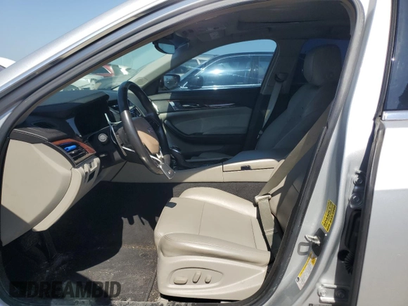2016 Cadillac CTS RWD with VIN 1G6AP5SX4G0132098, listed as a Copart auction lot 52594175 with 104,683 mi miles and Salvage title. Bid and sale history available at DreamBid. Image 7.