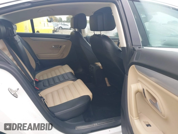 2016 Volkswagen CC Sport with VIN WVWBN7AN4GE512547, listed as a IAAI auction lot 40802001 with 94,513 mi miles. Bid and sale history available at carsss.com. Image 8.