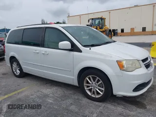 2014 Dodge Grand Caravan SXT z VIN 2C4RDGCGXER322705, wystawiony jako IAAI lot #42450791 z przebiegiem 147 113 mil mil oraz . Historia ofert i sprzedaży dostępna na DreamBid. Obrazek 1.