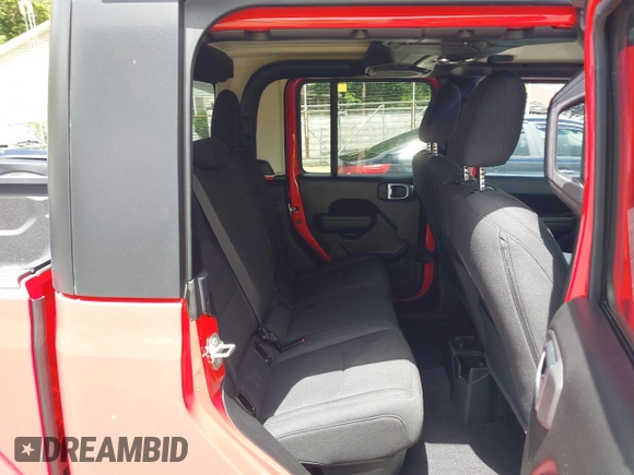 2023 Jeep Gladiator Sport S with VIN 1C6HJTAG8PL572270, listed as a IAAI auction lot 42336294 with 13,865 mi miles and . Bid and sale history available at DreamBid. Image 8.
