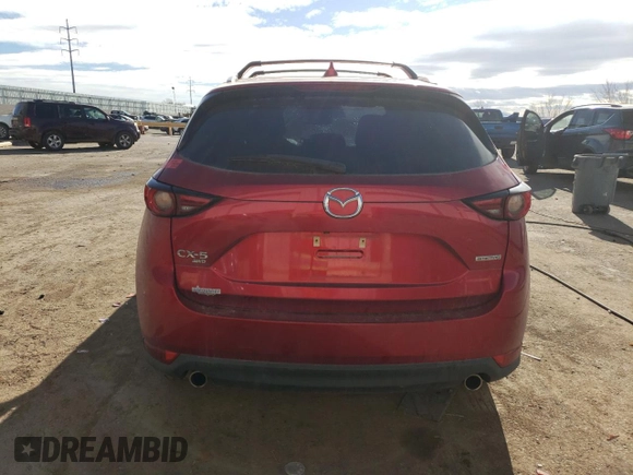 2020 Mazda CX-5 Grand Touring with VIN JM3KFBDM9L1820907, listed as a Copart auction lot 86166054 with 34,007 mi miles and Salvage Title. Bid and sale history available at carsss.com. Image 6.
