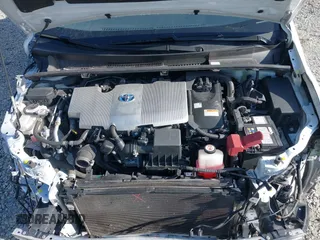 2020 Toyota Prius L Eco with VIN JTDKARFU5L3124692, listed as a IAAI auction lot 42019339 with 178,081 mi miles. Bid and sale history available at carsss.com. Image 10.