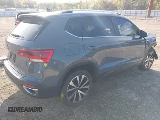 2022 Volkswagen Taos SE z VIN 3VVLX7B26NM077297, wystawiony jako IAAI lot #41846563 z przebiegiem 63 161 mil mil oraz . Historia ofert i sprzedaży dostępna na DreamBid. Obrazek 4.
