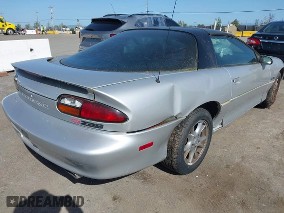 2002 Chevrolet Camaro Z28 z VIN 2G1FP22G722167574, wystawiony jako IAAI lot #41976510 z przebiegiem 114 863 mil mil oraz . Historia ofert i sprzedaży dostępna na DreamBid. Obrazek 4.