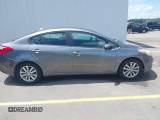 2016 Kia Forte LX z VIN KNAFX4A67G5550953, wystawiony jako IAAI lot #42183097 z przebiegiem 103 512 mil mil oraz . Historia ofert i sprzedaży dostępna na DreamBid. Obrazek 13.