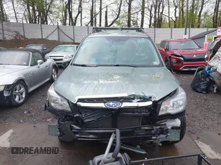 2017 Subaru Forester z VIN JF2SJABC4HH452602, wystawiony jako IAAI lot #42197639 z przebiegiem 141 385 mil mil oraz . Historia ofert i sprzedaży dostępna na DreamBid. Obrazek 13.