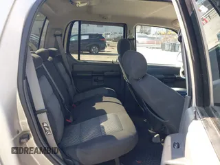 2004 Ford Explorer Sport Trac XLS z VIN 1FMZU77K74UA28903, wystawiony jako IAAI lot #41891563 z przebiegiem 186 399 mil mil oraz . Historia ofert i sprzedaży dostępna na DreamBid. Obrazek 8.