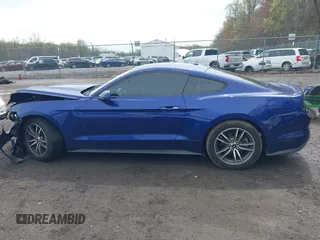 2015 Ford Mustang EcoBoost with VIN 1FA6P8TH9F5317329, listed as a IAAI auction lot 41966041 with 61,357 mi miles and . Bid and sale history available at carsss.com. Image 14.