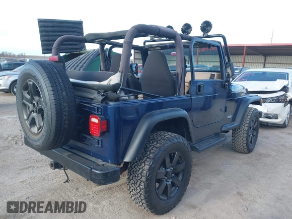 2001 Jeep Wrangler Sport with VIN 1J4FA49S41P334053, listed as a IAAI auction lot 41884967 with 158,258 mi miles. Bid and sale history available at carsss.com. Image 4.
