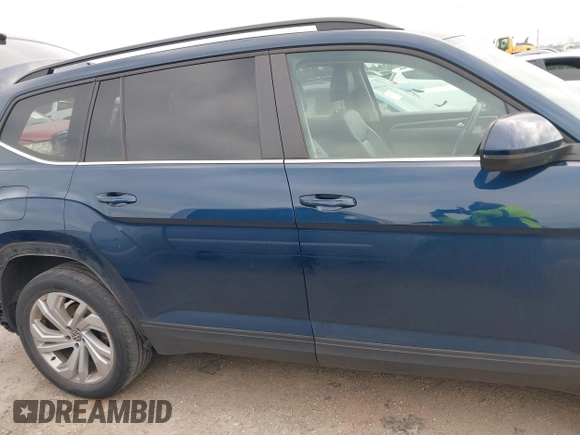 2021 Volkswagen Atlas SE z VIN 1V2JR2CA3MC555490, wystawiony jako IAAI lot #41286240 z przebiegiem 89 435 mil mil oraz . Historia ofert i sprzedaży dostępna na DreamBid. Obrazek 14.