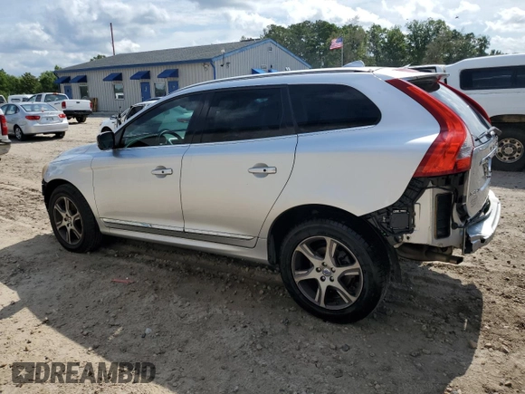 2014 Volvo XC60 R-Design Premier Plus with VIN YV4902DZ5E2516262, listed as a Copart auction lot 57967335 with 123,313 mi miles and Salvage title. Bid and sale history available at DreamBid. Image 2.