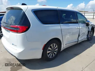 2023 Chrysler Pacifica Hybrid Limited with VIN 2C4RC1S75PR559106, listed as a IAAI auction lot 42613325 with 62,749 mi miles and . Bid and sale history available at DreamBid. Image 4.