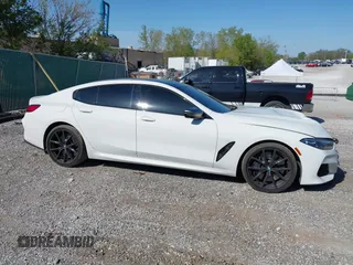 2022 BMW 8 Series M850i with VIN WBAGV8C09NCH15245, listed as a IAAI auction lot 42053154 with 26,384 mi miles and . Bid and sale history available at DreamBid. Image 13.
