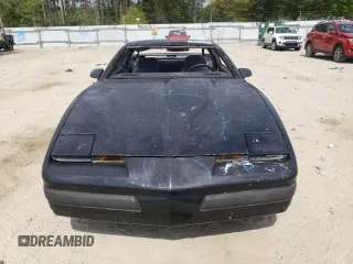 1987 Pontiac Firebird z VIN 1G2FS2184HL222415, wystawiony jako Copart lot #54878805 z przebiegiem 97 287 mil mil oraz Szkody całkowita. Historia ofert i sprzedaży dostępna na DreamBid. Obrazek 5.