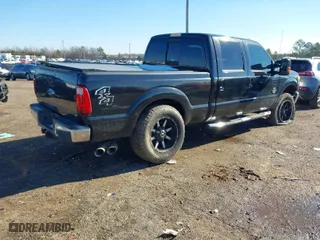 2015 Ford Super Duty F-250 SRW Lariat with VIN 1FT7W2BT2FEA01422, listed as a IAAI auction lot 41281819 with 170,832 mi miles. Bid and sale history available at carsss.com. Image 4.