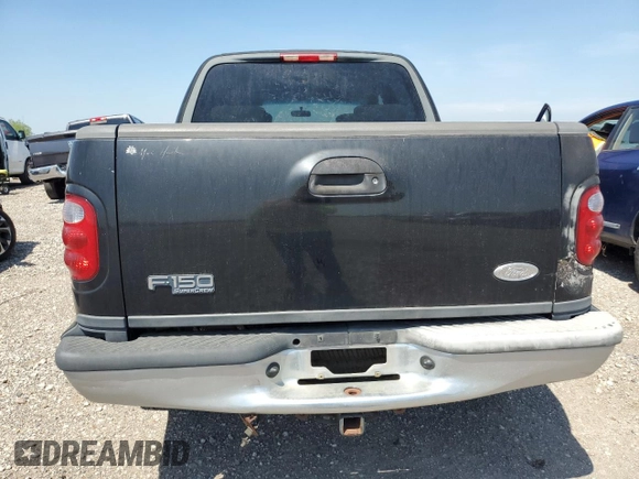 2003 Ford F-150 XLT with VIN 1FTRW07623KD82847, listed as a Copart auction lot 50303265 with 156,781 mi miles and Clean Title. Bid and sale history available at carsss.com. Image 6.