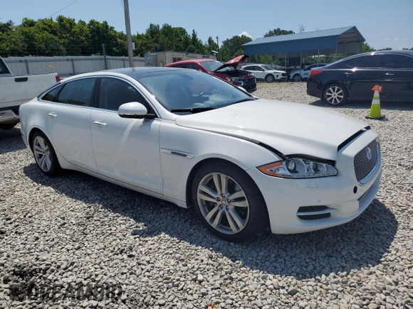 2011 Jaguar XJ XJL with VIN SAJWA2GB6BLV14612, listed as a Copart auction lot 63660355 with 93,763 mi miles and Salvage title. Bid and sale history available at DreamBid. Image 4.