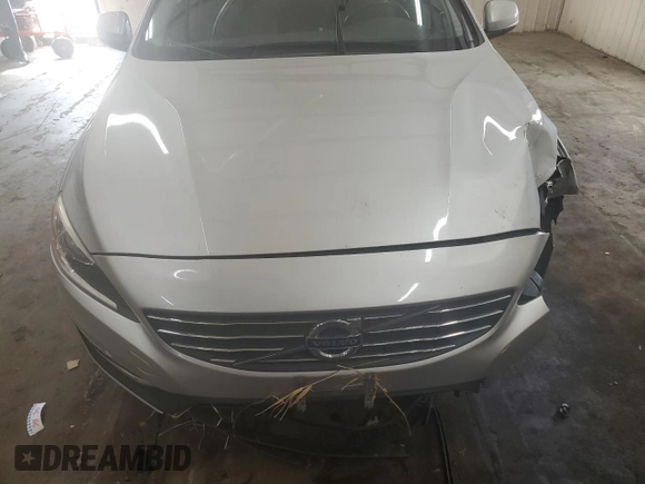2016 Volvo S60 T5 Premier z VIN YV1612TK9G2393764, wystawiony jako Copart lot #53314985 z przebiegiem 112 858 mil mil oraz Szkoda całkowita • Salvage title. Historia ofert i sprzedaży dostępna na DreamBid. Obrazek 11.