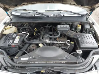 2000 Jeep Grand Cherokee Laredo z VIN 1J4GW48S2YC390226, wystawiony jako IAAI lot #42326715 z przebiegiem 273 806 mil mil oraz . Historia ofert i sprzedaży dostępna na DreamBid. Obrazek 10.