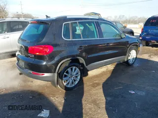 2016 Volkswagen Tiguan S with VIN WVGBV7AX3GW522378, listed as a IAAI auction lot 41391294 with 106,278 mi miles and . Bid and sale history available at DreamBid. Image 4.
