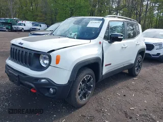 2023 Jeep Renegade Trailhawk z VIN ZACNJDC16PPP73152, wystawiony jako IAAI lot #42128199 z przebiegiem 2 779 mil mil oraz . Historia ofert i sprzedaży dostępna na DreamBid. Obrazek 2.