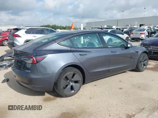 2023 Tesla Model 3 with VIN 5YJ3E1EA7PF567906, listed as a IAAI auction lot 42280993 with 41,452 mi miles and . Bid and sale history available at DreamBid. Image 4.