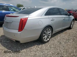 2013 Cadillac XTS Luxury с VIN 2G61P5S30D9122912, выставлен на аукционе Copart как лот 56970895 с пробегом 189 310 миль миль и Списание • Salvage title. История ставок и продаж доступна на DreamBid. Изображение 3.