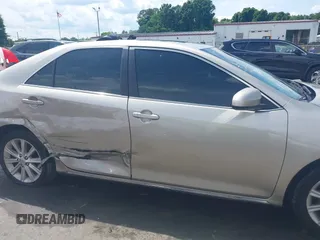 2014 Toyota Camry SE z VIN 4T1BK1FK6EU551126, wystawiony jako IAAI lot #42192663 z przebiegiem 178 875 mil mil oraz . Historia ofert i sprzedaży dostępna na DreamBid. Obrazek 13.